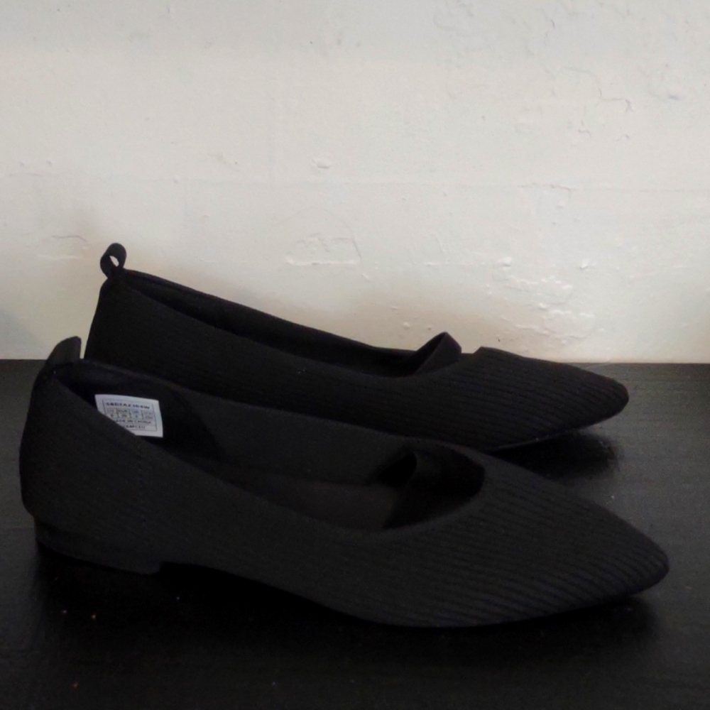 Burudani Slip ons black size 8